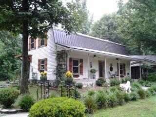 7282 Kingston Road Fairview, TN 37062 - Photo 3 of 20 a view of a house with sitting area and garden