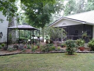 7282 Kingston Road Fairview, TN 37062 - Photo 5 of 20 a view of a house with backyard and sitting area