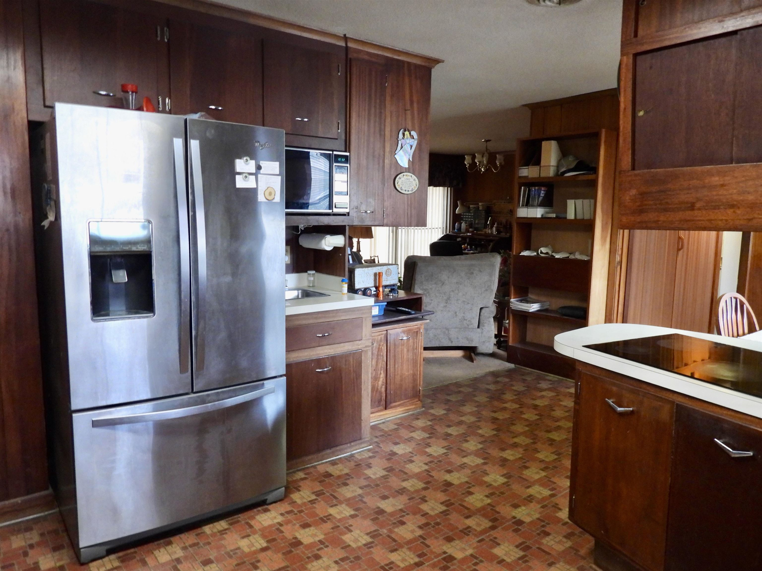 3007 Old Raleigh Road Apex, NC 27502 - Photo 4 of 39 a kitchen with stainless steel appliances granite countertop a refrigerator a sink a stove and a refrigerator