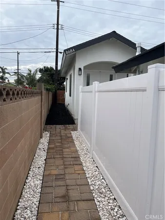 a view of a pathway with a balcony