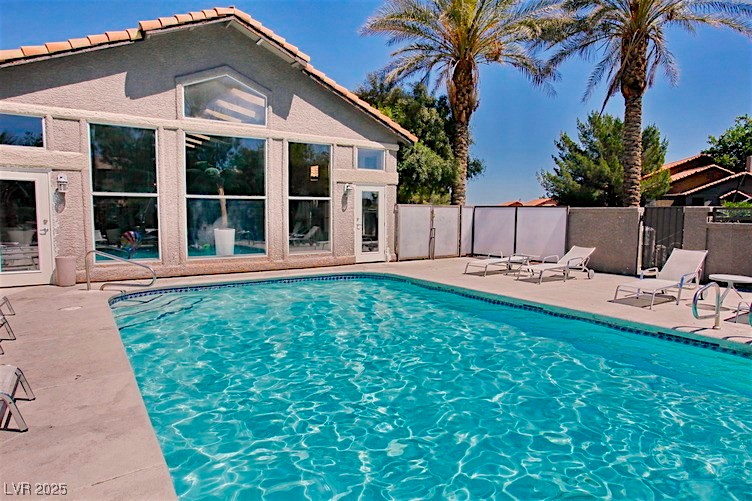 2750 South Durango Drive, Unit 2139 Las Vegas, NV 89117 - Photo 20 of 21 View of pool with a patio