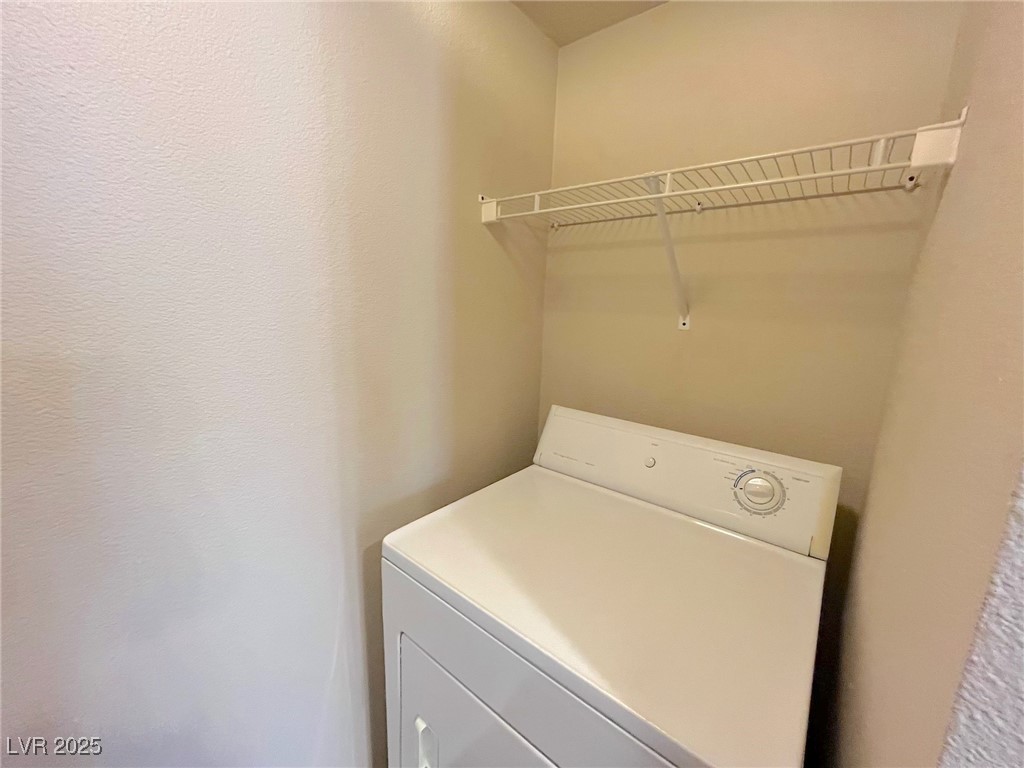2750 South Durango Drive, Unit 2139 Las Vegas, NV 89117 - Photo 7 of 21 Washroom featuring washer / clothes dryer