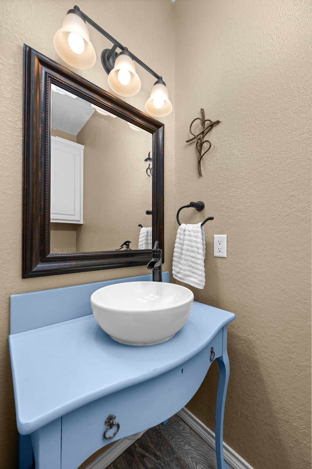 108 Thornwood Road Georgetown, TX 78628 - Photo 25 of 40 A vessel sink vanity provides a touch of character in this compact powder room.