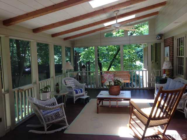 907 Temple Street Raleigh, NC 27609 - Photo 2 of 11 Huge Screened Porch just waiting for you, your guests and your family!
