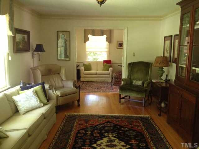 907 Temple Street Raleigh, NC 27609 - Photo 3 of 11 Spacious Living and Dining Room with lovely hardwood floors!