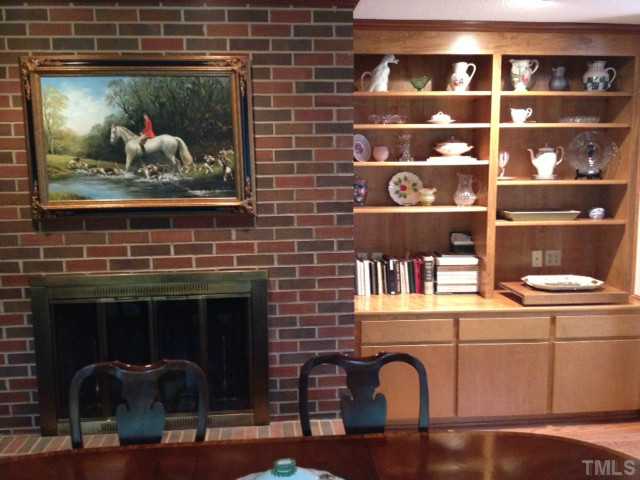 907 Temple Street Raleigh, NC 27609 - Photo 5 of 11 Fantastic Fireplace and Built-In Bookcases! Hardwoods throughout 1st Floor!