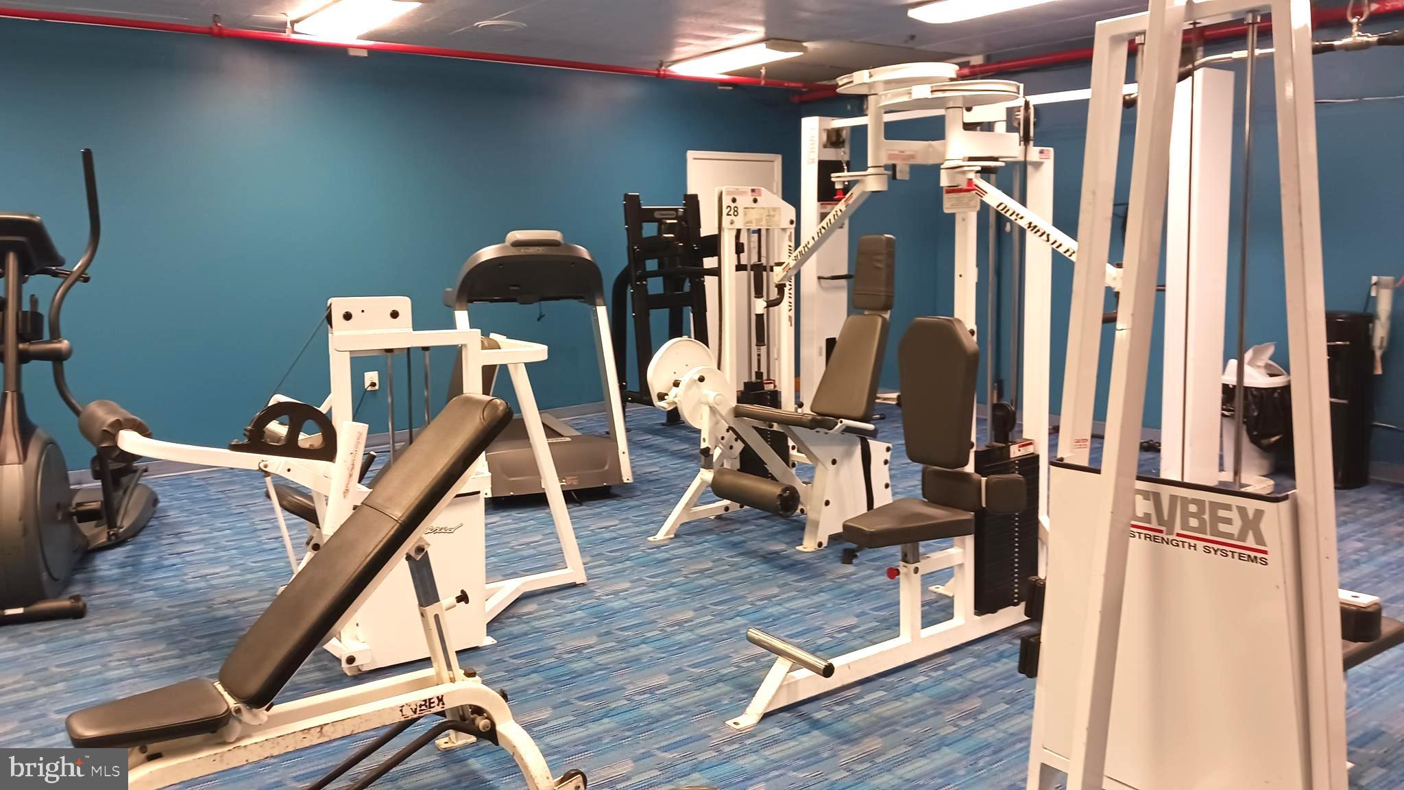 1324 Locust Street, Unit 1421 Philadelphia, PA 19107 - Photo 5 of 15 a view of a room with gym equipment