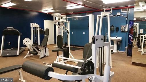 1324 Locust Street, Unit 1421 Philadelphia, PA 19107 - Photo 6 of 15 a view of a room with gym equipment
