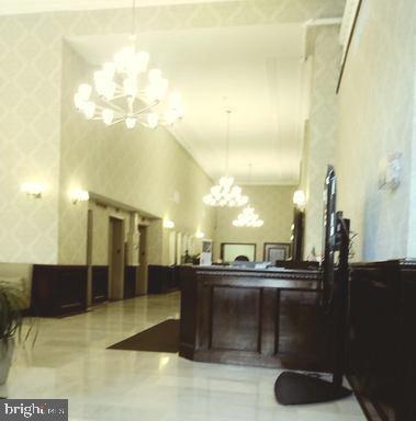 1324 Locust Street, Unit 1421 Philadelphia, PA 19107 - Photo 7 of 15 a bathroom with a sink and a mirror
