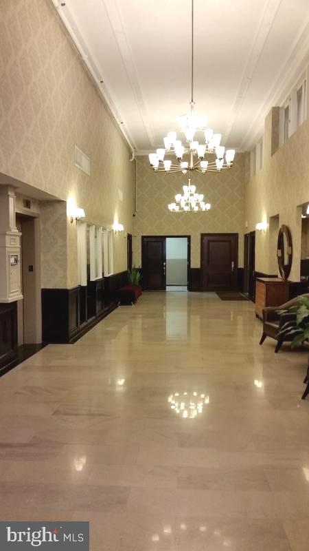 1324 Locust Street, Unit 1421 Philadelphia, PA 19107 - Photo 9 of 15 a view of a lobby with black carpet