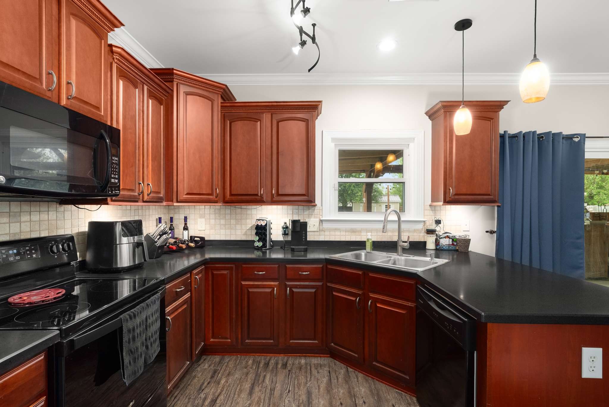 1105 Mantle Way Murfreesboro, TN 37129 - Photo 1 of 47 a kitchen with stainless steel appliances granite countertop wooden cabinets a stove a sink and dishwasher