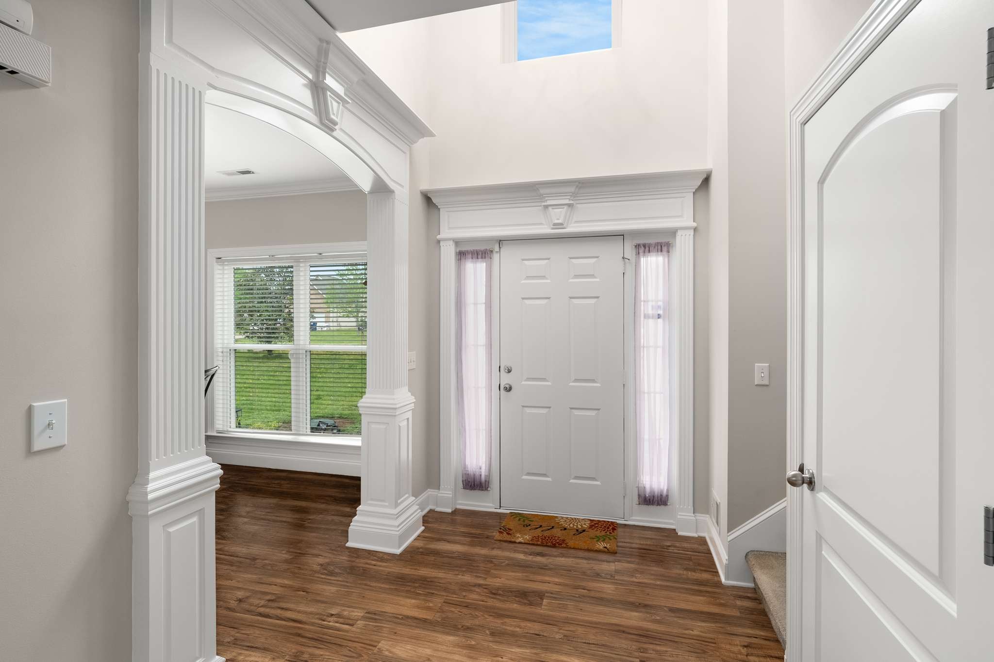 1105 Mantle Way Murfreesboro, TN 37129 - Photo 21 of 47 a view of an empty room with wooden floor and a window