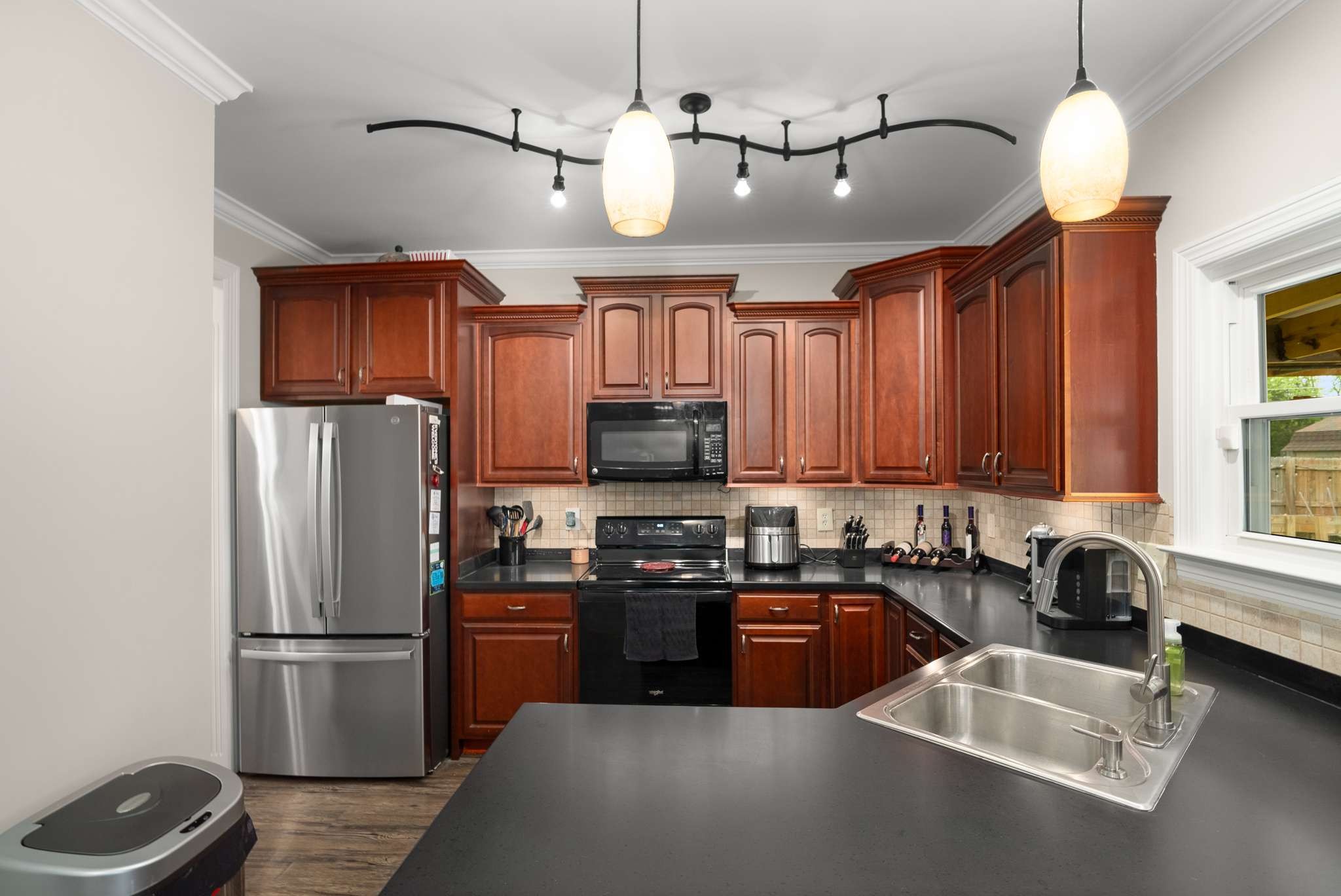 1105 Mantle Way Murfreesboro, TN 37129 - Photo 26 of 47 a kitchen with a refrigerator a sink and a stove