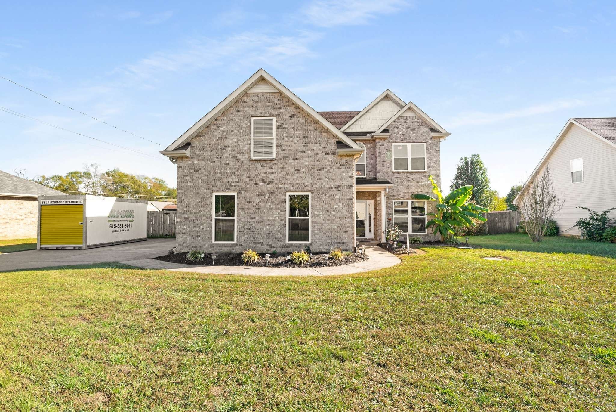 1105 Mantle Way Murfreesboro, TN 37129 - Photo 3 of 47 a front view of a house with a yard
