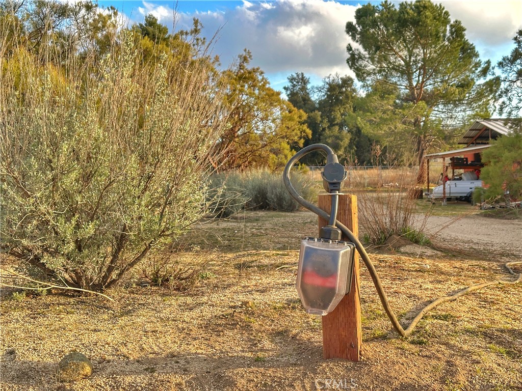 29842 Chihuahua Valley Road, Unit C Warner Springs, CA 92086 - Photo 3 of 17 a backyard of a house with lots of green space