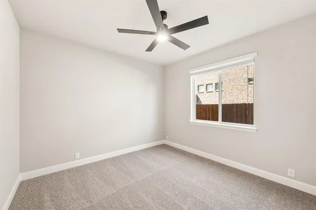 a bathroom with a sink toilet vanity and shower