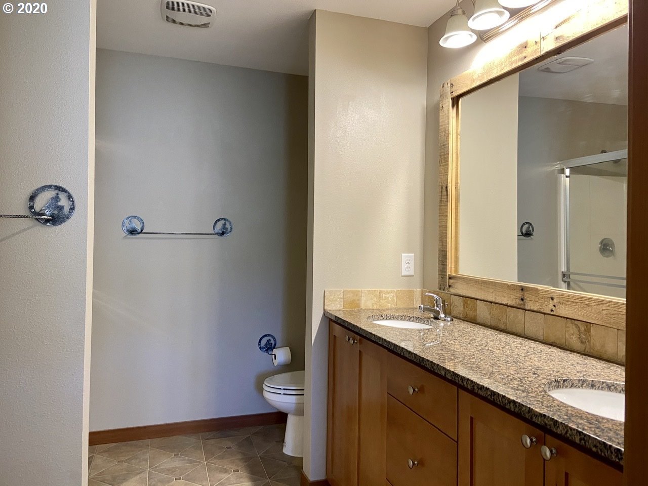 1998 Pruner Road Riddle, OR 97469 - Photo 5 of 22 a bathroom with a granite countertop sink mirror vanity and toilet