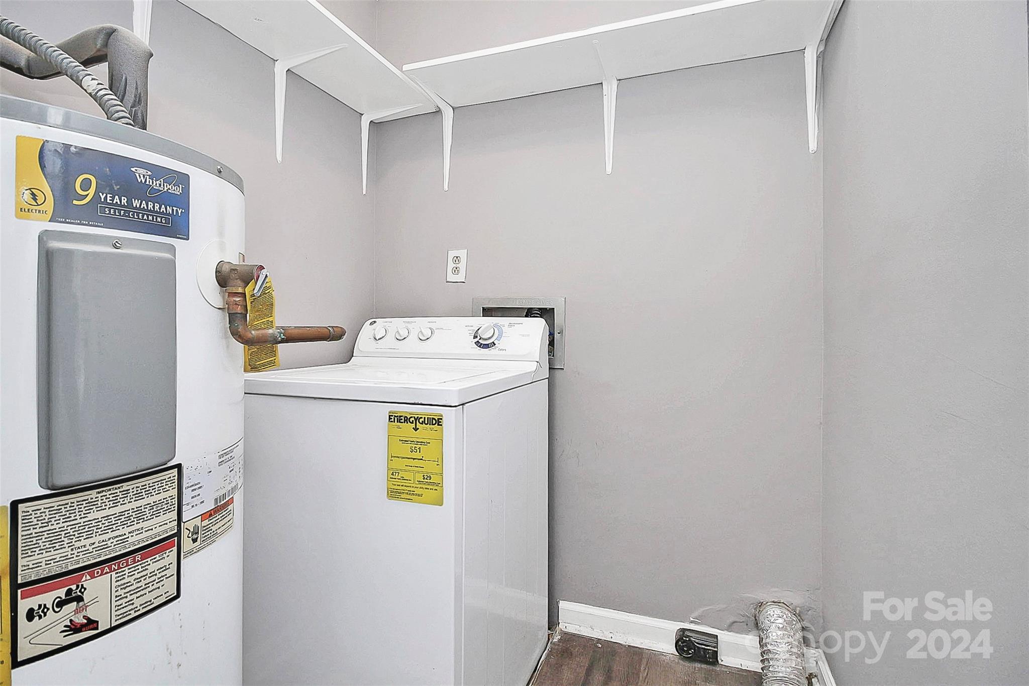 9409 Old Concord Road, Unit M Charlotte, NC 28213 - Photo 16 of 29 a utility room with dryer and washer