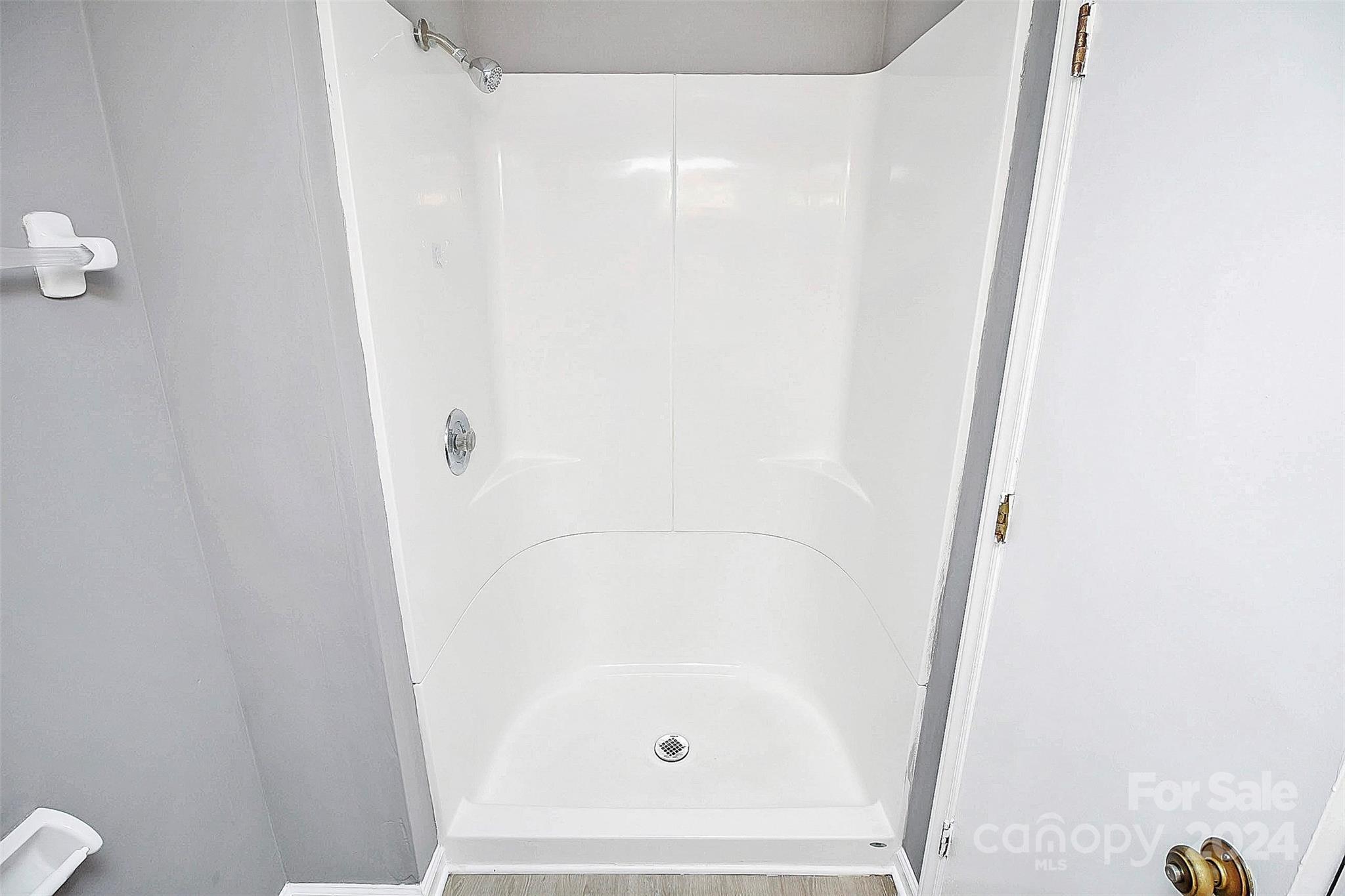 9409 Old Concord Road, Unit M Charlotte, NC 28213 - Photo 25 of 29 a bathroom with a shower