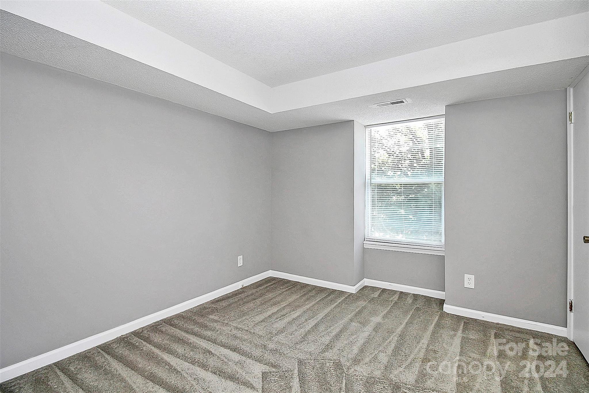 9409 Old Concord Road, Unit M Charlotte, NC 28213 - Photo 26 of 29 an empty room with a window