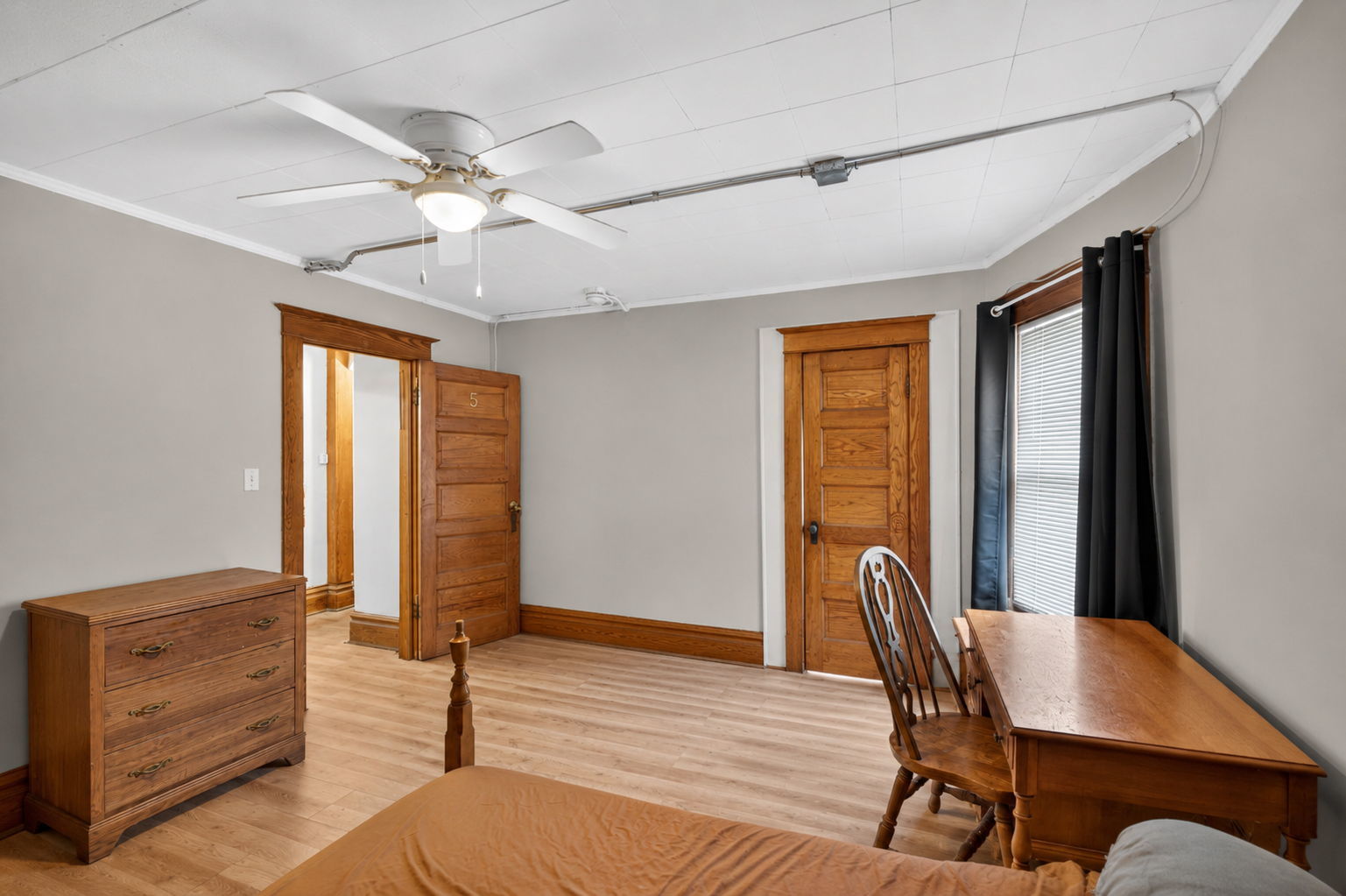 226 West Locust Street DeKalb, IL 60115 - Photo 20 of 40 a view of a livingroom with furniture window and wooden floor