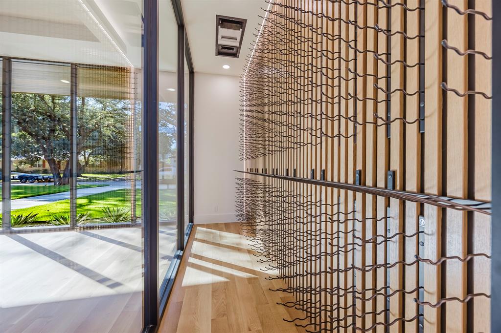 5723 Meletio Lane Dallas, TX 75230 - Photo 11 of 38 Detailed view of wood finished floors and recessed lighting