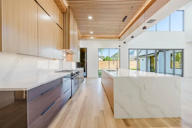 a view of a living room with a large window