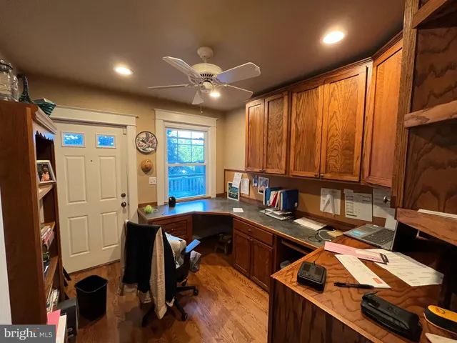 a kitchen with stainless steel appliances granite countertop sink stove and cabinets