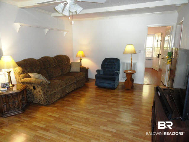 622 Spanish Main Spanish Fort, AL 36527 - Photo 6 of 25 Laminate Flooring and Painted Wood Beams in Great Room