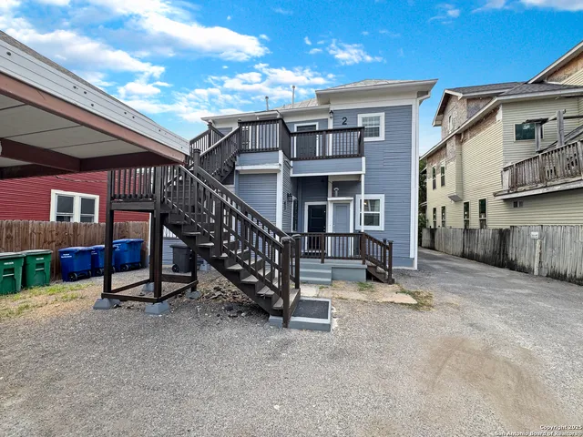 a view of front a house with a street