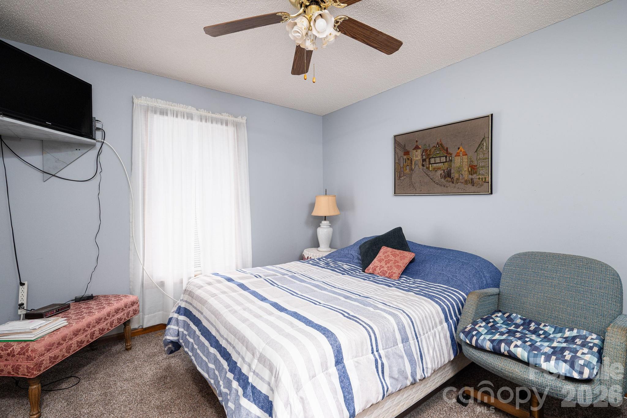 3815 Wildcherry Road Shelby, NC 28150 - Photo 20 of 33 a bedroom with a bed and dresser