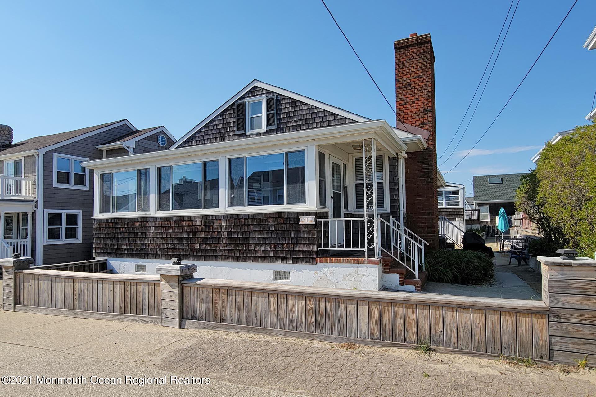 a front view of a house with glass windows