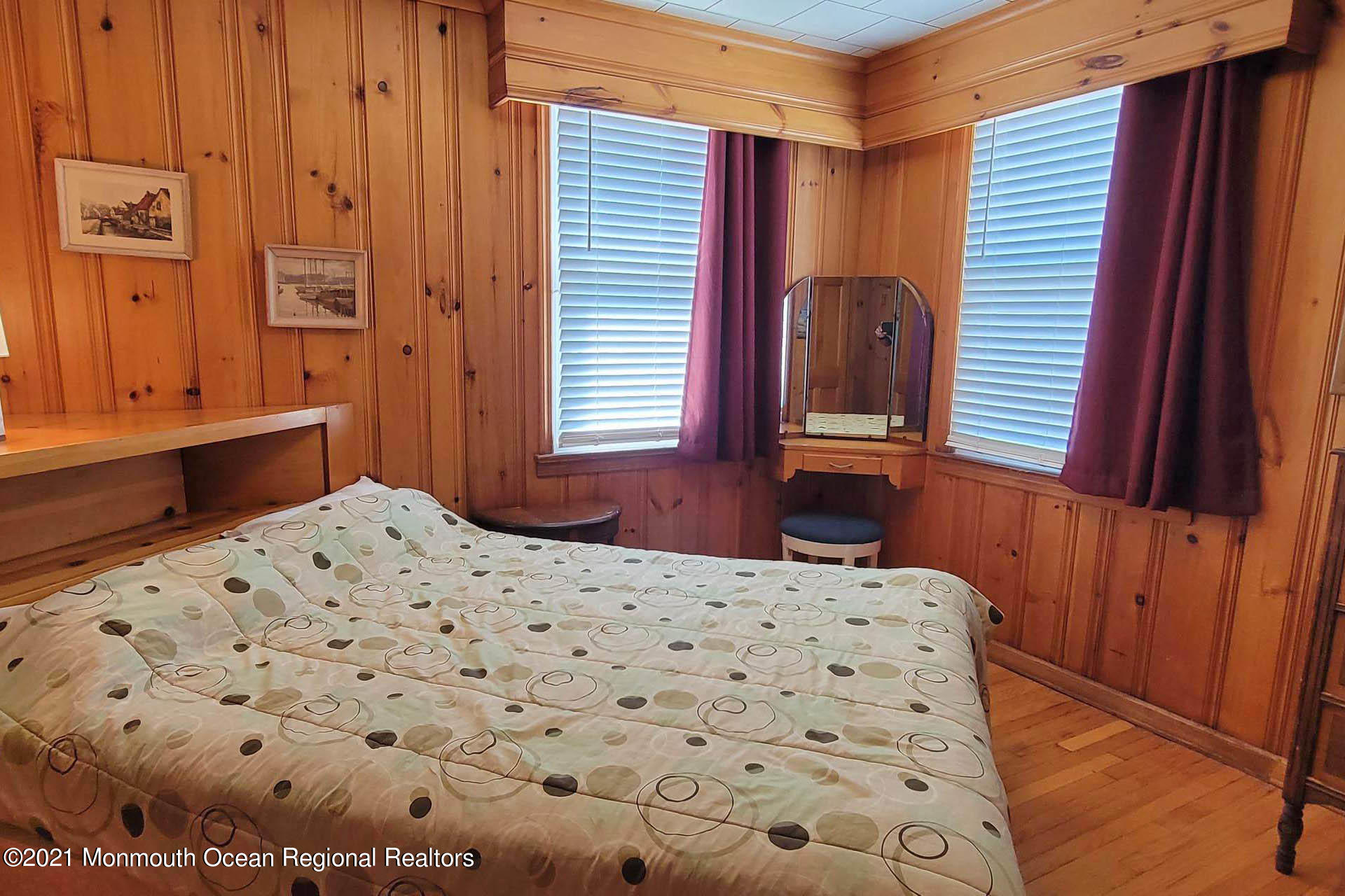 1 Brooklyn Avenue Lavallette, NJ 08735 - Photo 12 of 55 a bedroom with a bed and a dresser