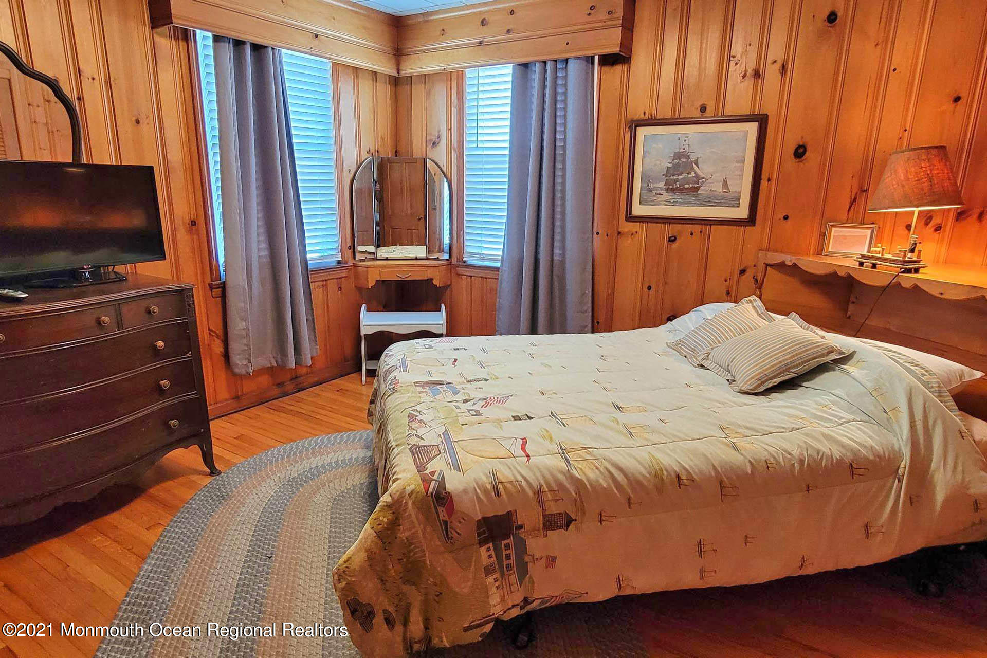 1 Brooklyn Avenue Lavallette, NJ 08735 - Photo 13 of 55 a bedroom with a bed and a flat screen tv