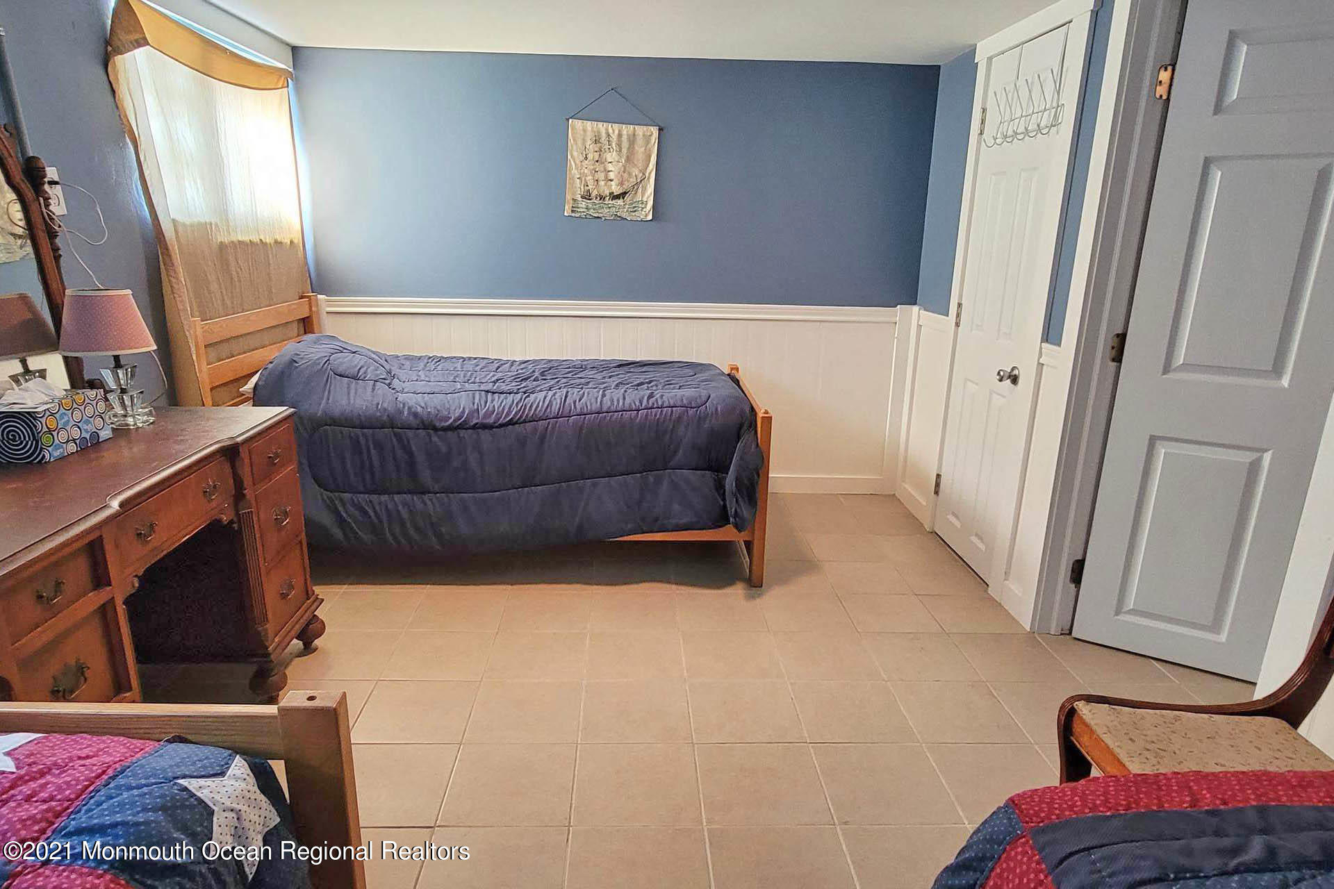 1 Brooklyn Avenue Lavallette, NJ 08735 - Photo 20 of 55 a bedroom with a bed and a window