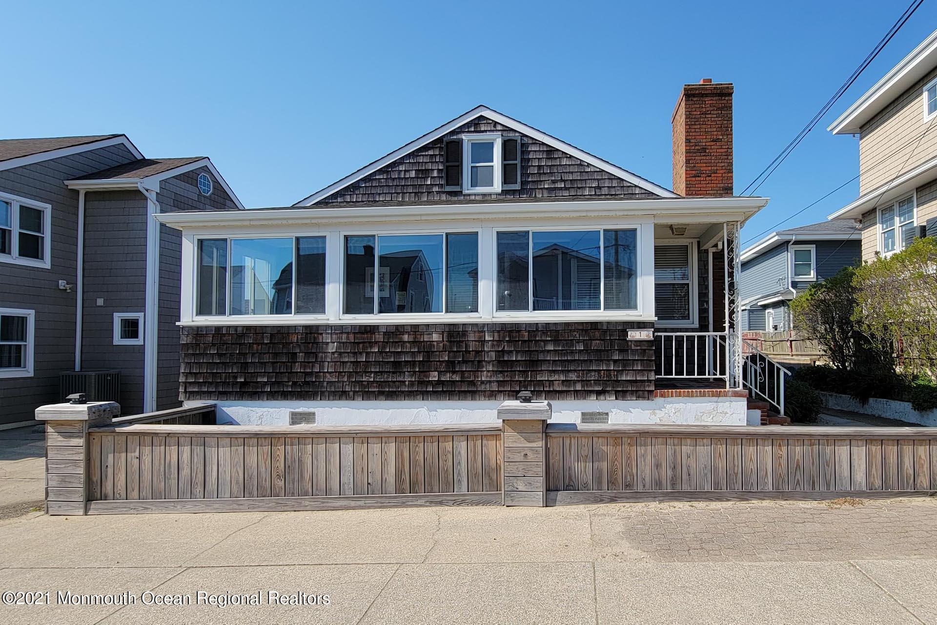1 Brooklyn Avenue Lavallette, NJ 08735 - Photo 3 of 55 a front view of a house with garage