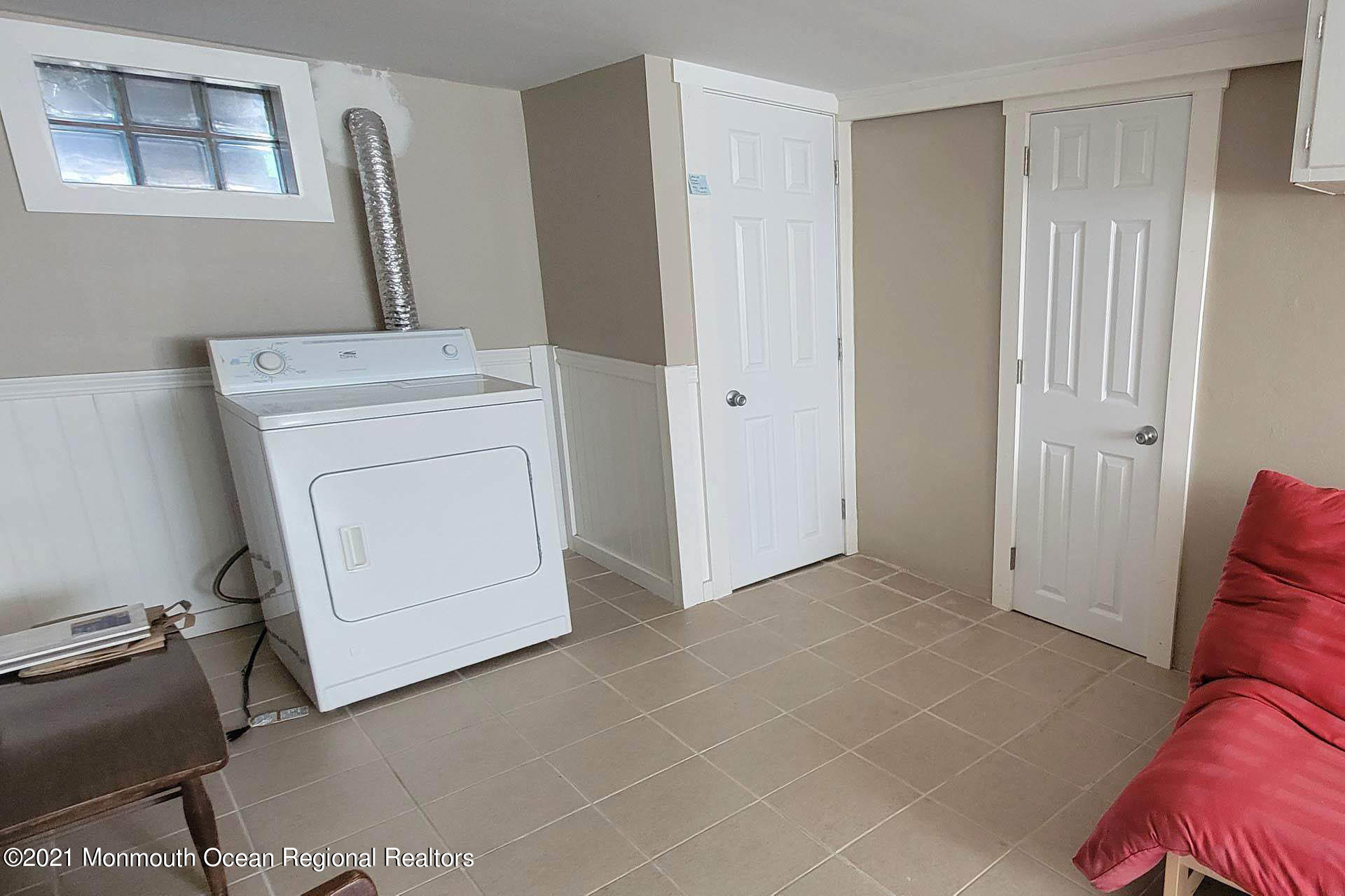1 Brooklyn Avenue Lavallette, NJ 08735 - Photo 24 of 55 a view of storage and utility room with washer and dryer