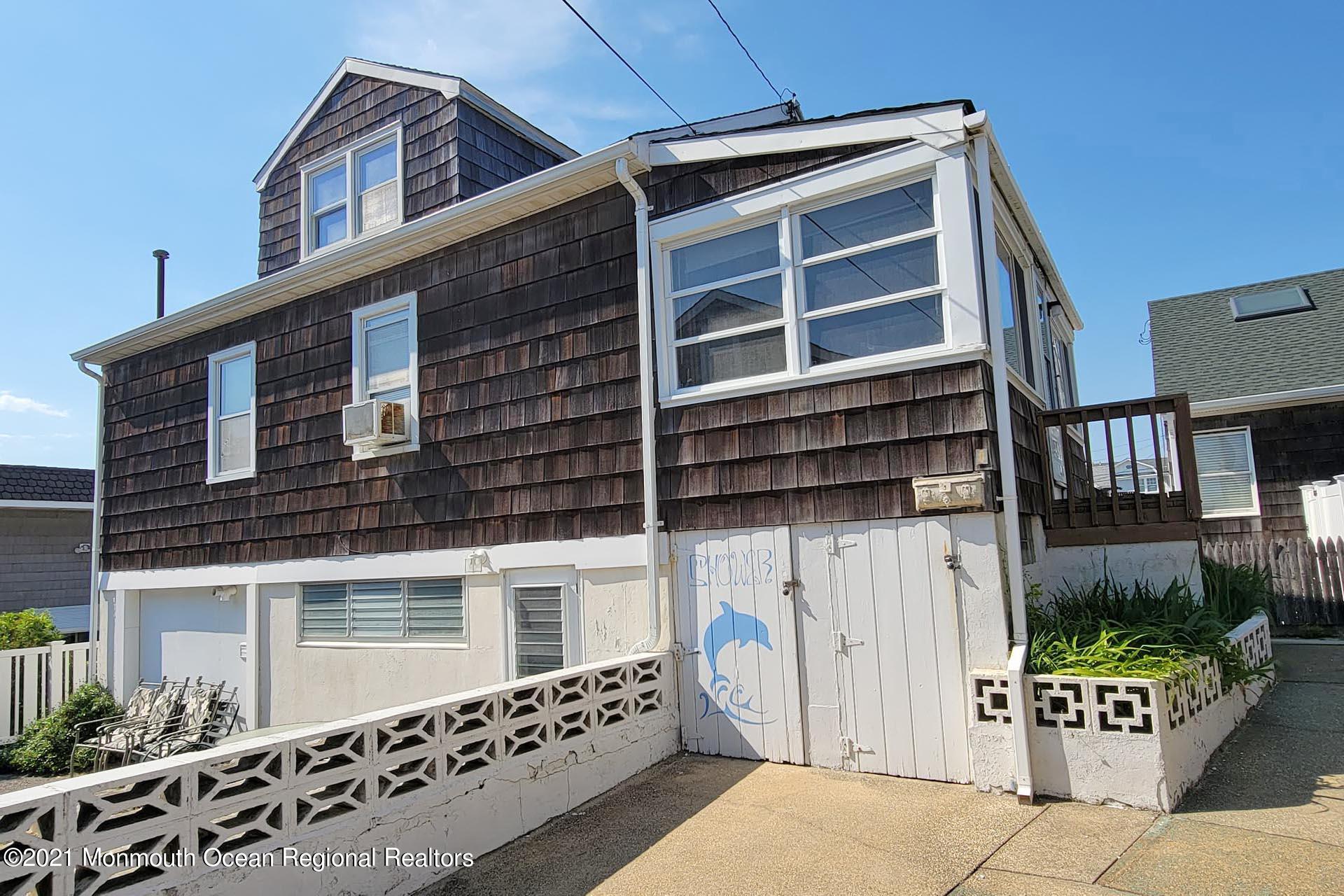 1 Brooklyn Avenue Lavallette, NJ 08735 - Photo 26 of 55 a front view of a house with windows