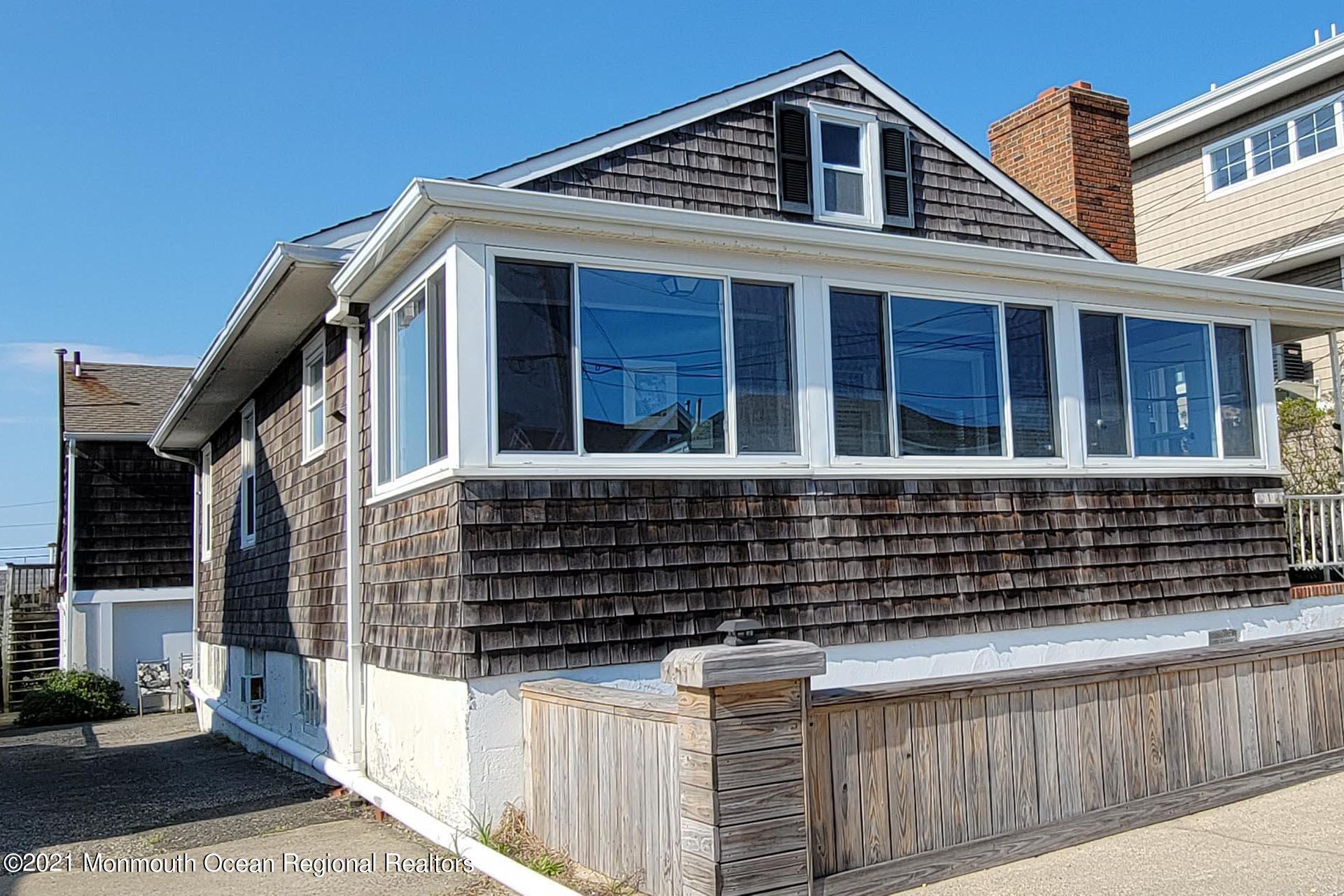 1 Brooklyn Avenue Lavallette, NJ 08735 - Photo 4 of 55 a front view of a house with windows