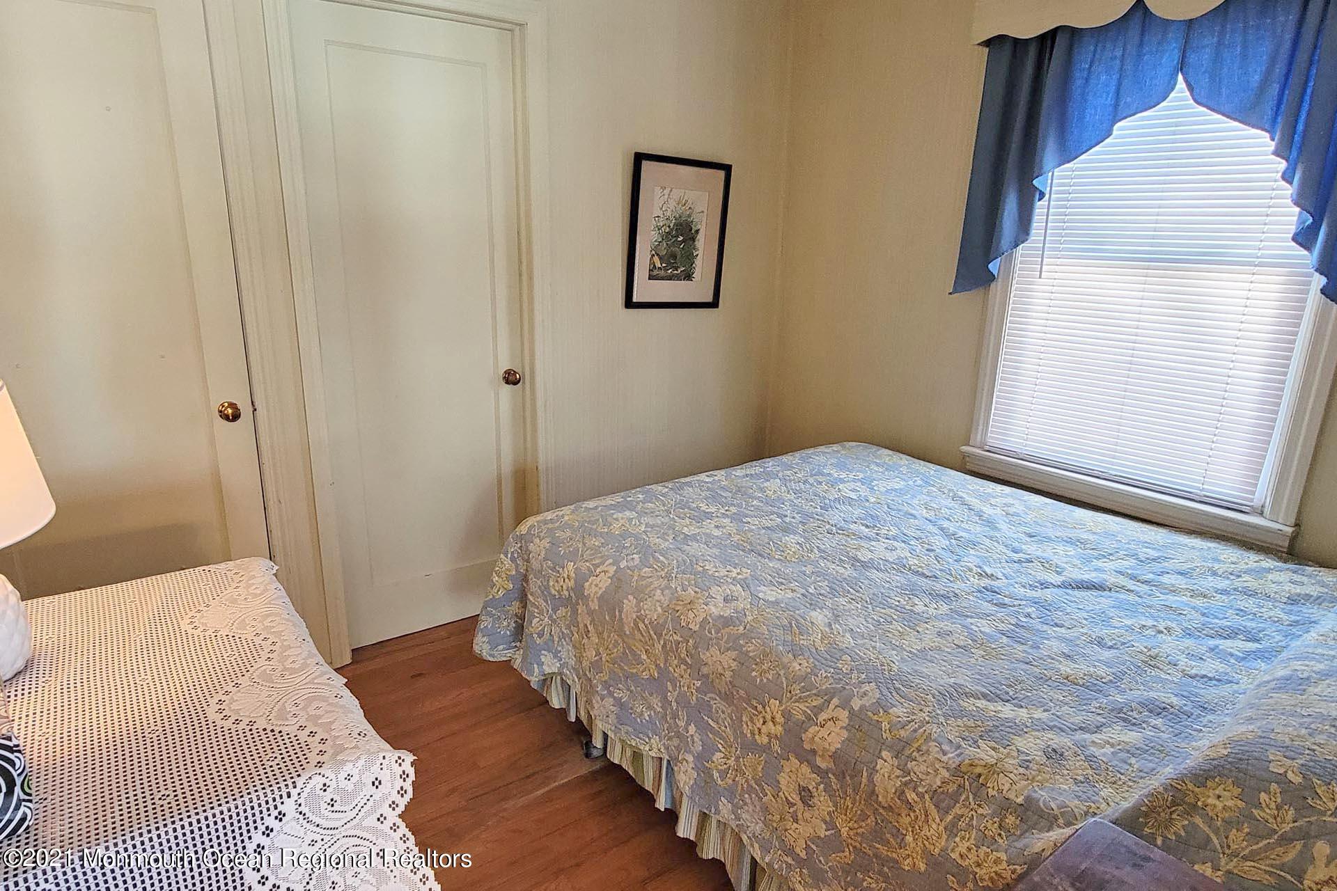 1 Brooklyn Avenue Lavallette, NJ 08735 - Photo 33 of 55 a bedroom with a bed and a window