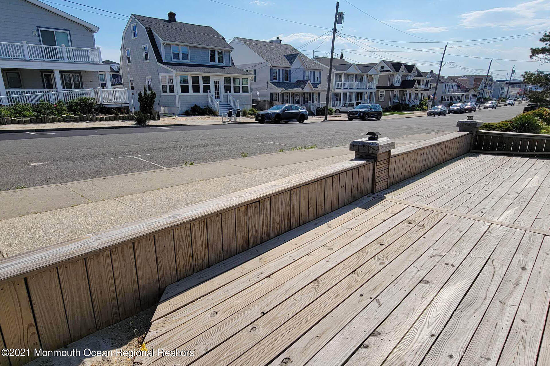 1 Brooklyn Avenue Lavallette, NJ 08735 - Photo 5 of 55 a view of a city street lined with buildings