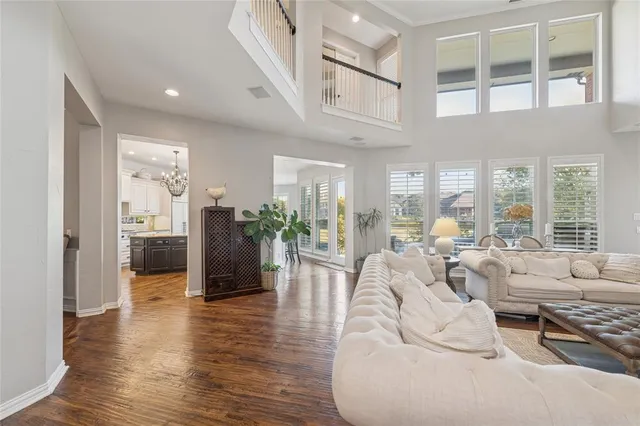 a living room with furniture and a table