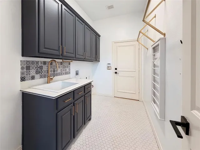 a bedroom with furniture and wooden floor
