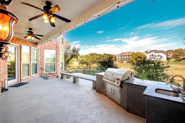 a view of a living room and balcony