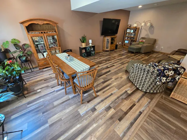 a dining room with furniture and window