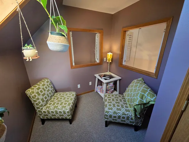 a view of a livingroom with furniture and toys