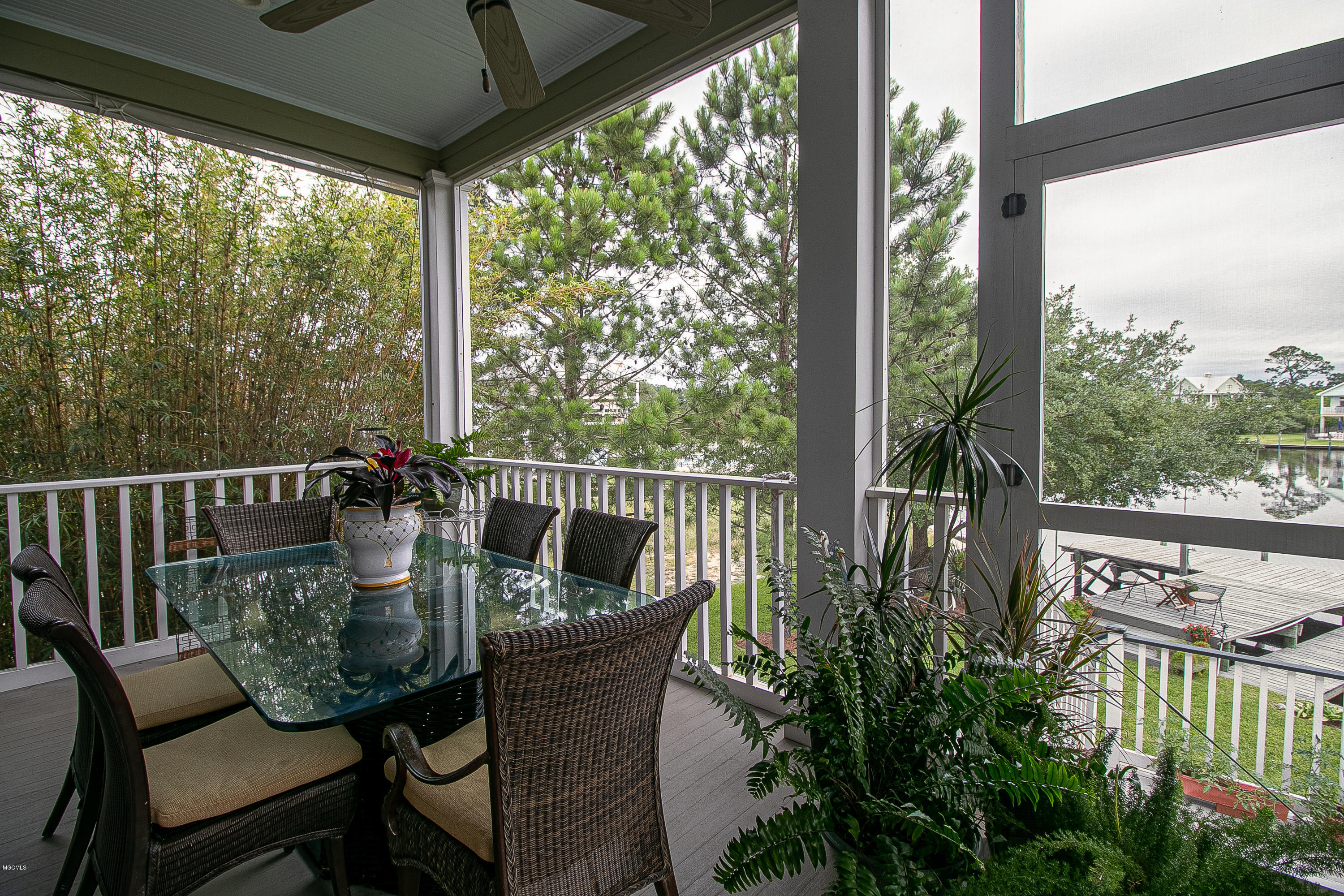 79 Poindexter Drive Pass Christian, MS 39571 - Photo 6 of 32 screened porch