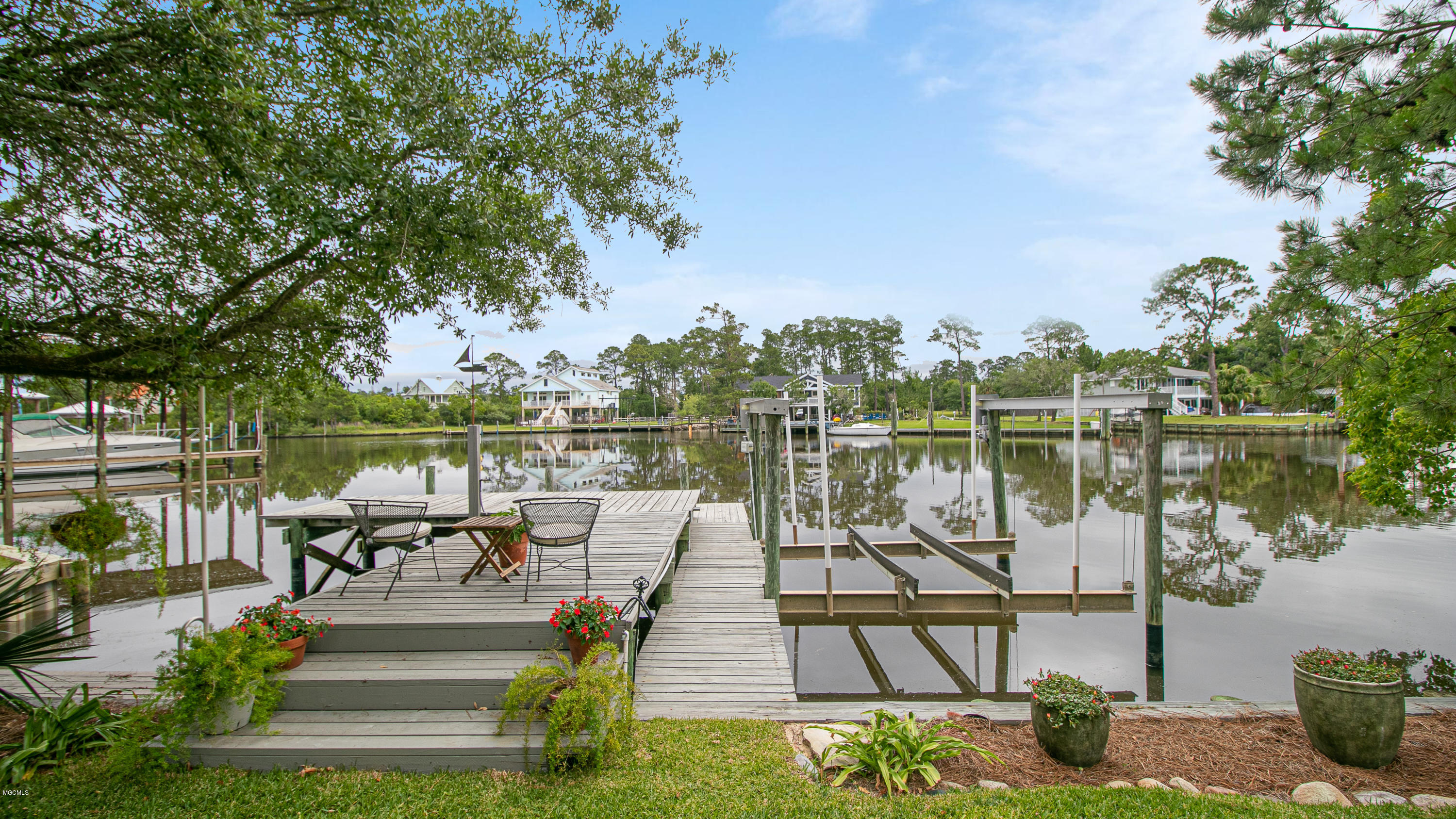 79 Poindexter Drive Pass Christian, MS 39571 - Photo 8 of 32 dock, boat lift and waterfront deck