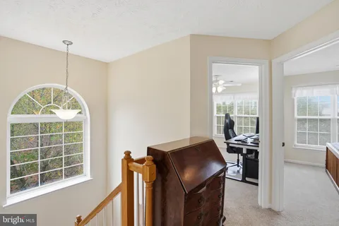 a view of a livingroom with furniture and window