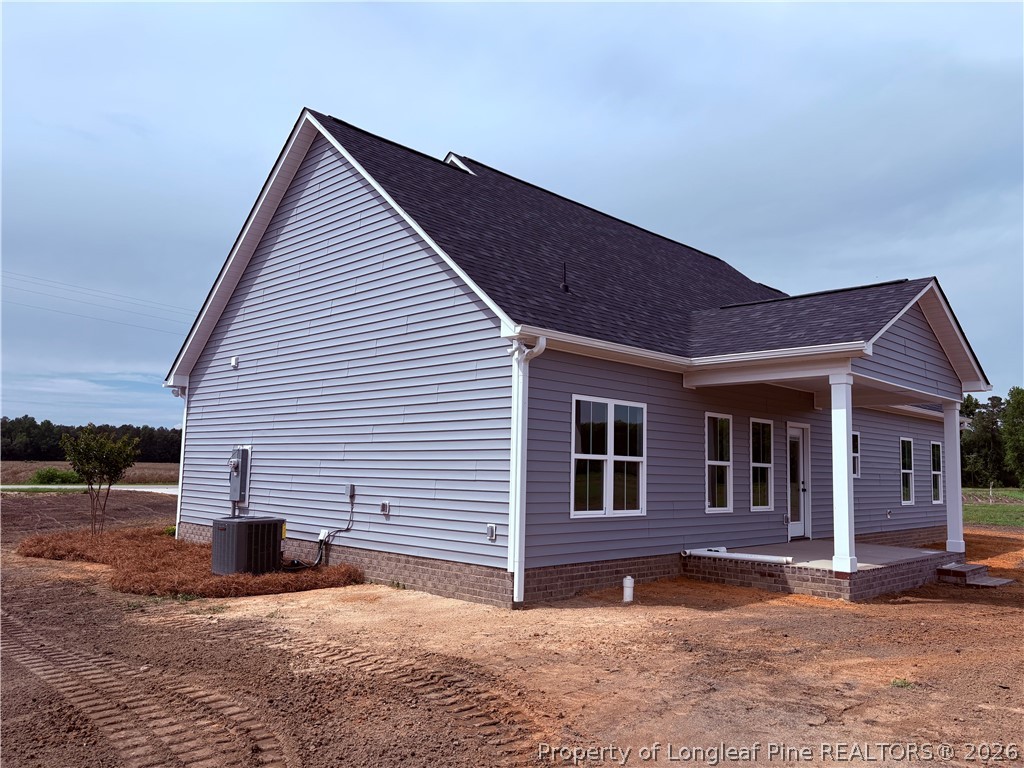 1075 Purdie-Hall Road Tar Heel, NC 28392 - Photo 21 of 28 a view of a house with a yard